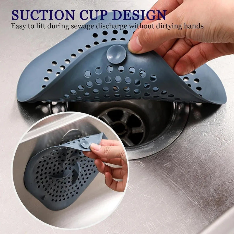 Suction cups hold the drain cover flat against the shower floor